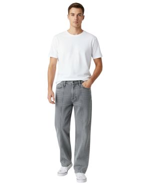 Jeans din bumbac cu croială largă și cusături decorative 25SMA03056